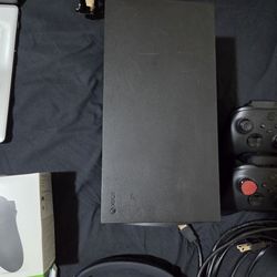 Xbox Series x with controllers and headset