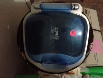 Lean mean fat grilling machine