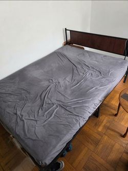 Metal Bed Frame with Wood Headboard and mattress, moving out sale. Must be sold