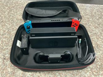 Nintendo switch gaming console with storage case