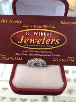 14 kt white gold & diamond wedding ring