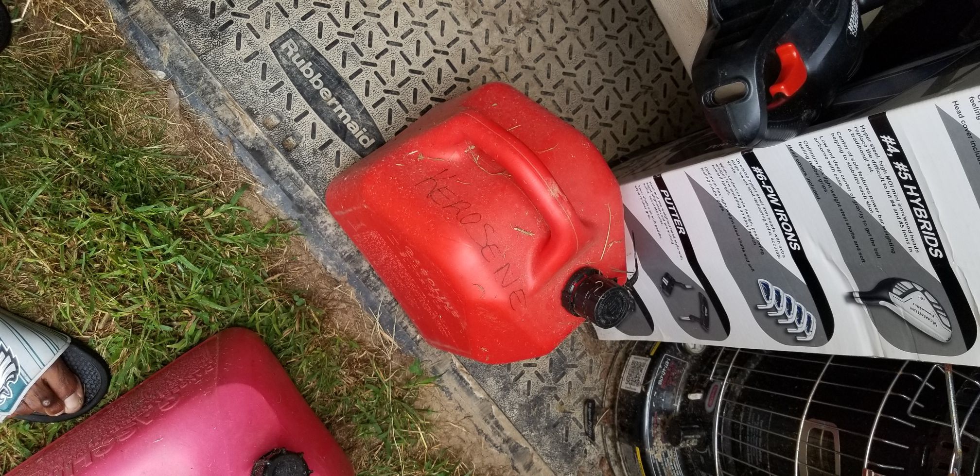 Kerosene heater and 5 gallon can, Toro lawn mower, and air compressor