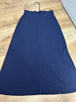 Joselin smith solid navy blue, long A-line or flared maxi skirt with an elastic drawstring waist.