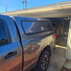 Nissan Titan XD Leer Canopy W/side Boxes.