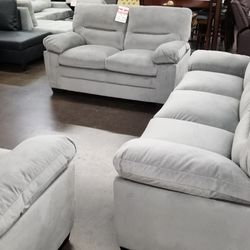 Light gray fabric sofa love and chair