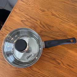 $5 - Oster saucepan with glass lid.  Please pick up within 24 hours greatly appreciated.  Thank you!