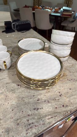 Ivory and gold dinnerware set