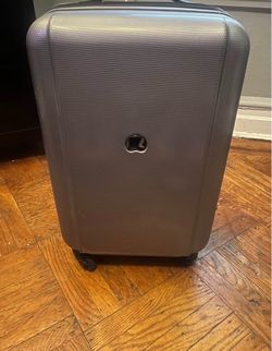 Delsey Hard Shell Spinner Luggage