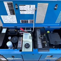 Miller Bobcat 200 Air Pack!
This is a 200 amp welder, 6500 watt
generator, and
30 CFM air compressor all in one! Perfect for any service truck.