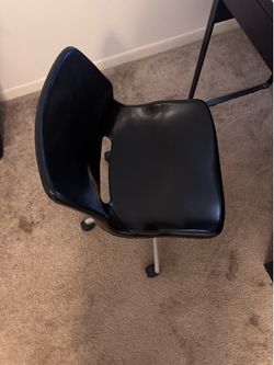 Black IKEA desk and chair