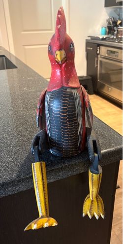Carved multicolored decorative wood chicken