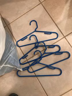 Kids blue sturdy plastic hangers