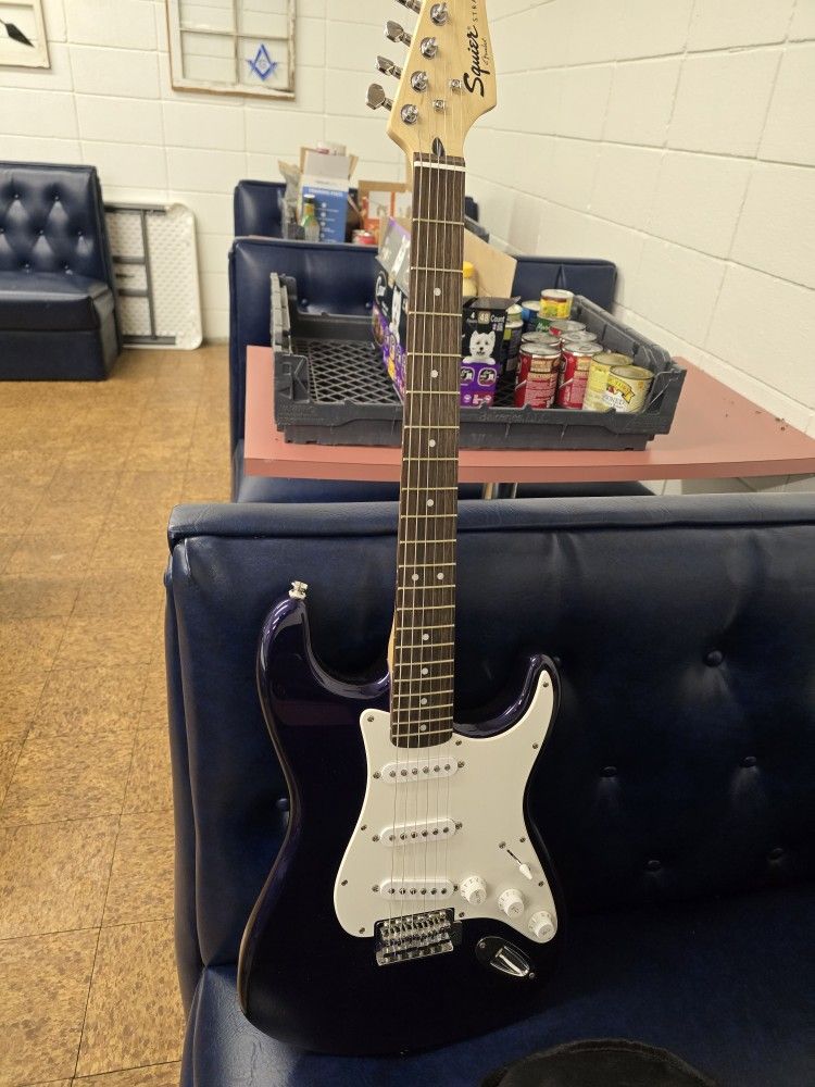 Fender Squire Electric Guitar and Fender Frontman AMP