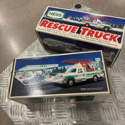 1994 Hess Rescue Truck- 2 collectible toy trucks released annually by Hess Corporation as part of a holiday tradition.. brand new in the original box 