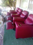 Red Italian leather theater chairs