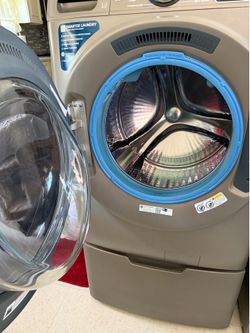 GE washer & dryer w/ pedestals