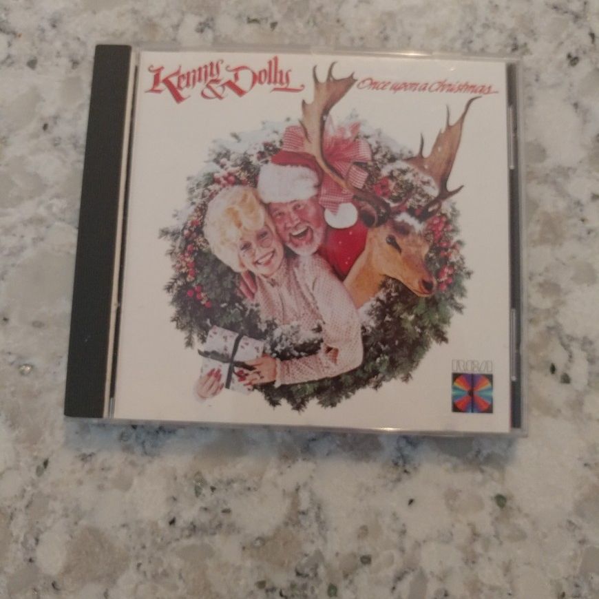 CD Titled Once Upon A Christmas Performed By Kenny And Dolly