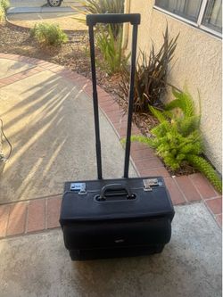 Rolling office brief case with combination locks