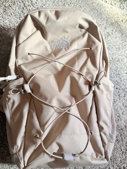 The North Face tan backpack