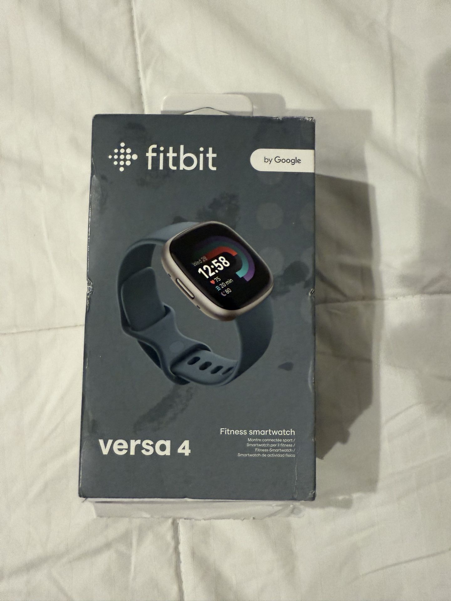 - [ ] Fitbit Versa 4 Smartwatch – Platinum & Waterfall Blue | Brand New Sealed