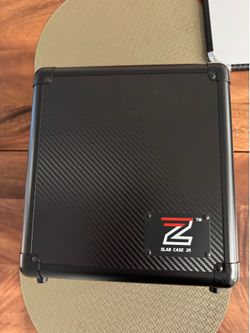 Zion 2 row black carbon fiber carrying case for sports cards/tcg - holds 60 slabs