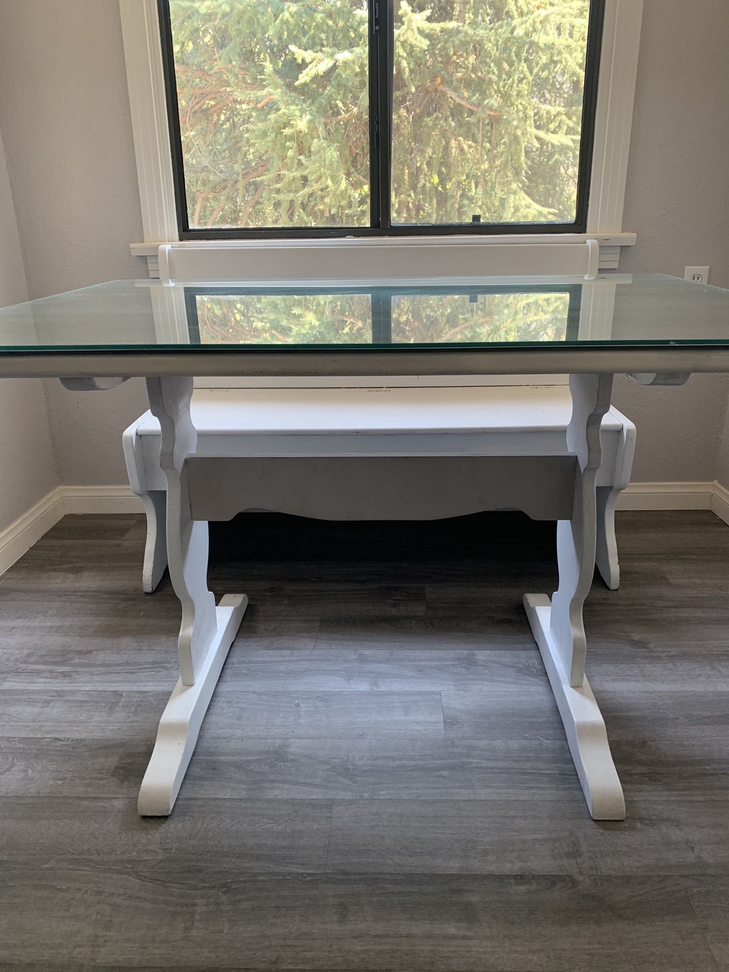 Glass top kitchen table with storage bench