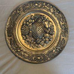 vintage embossed brass plate 