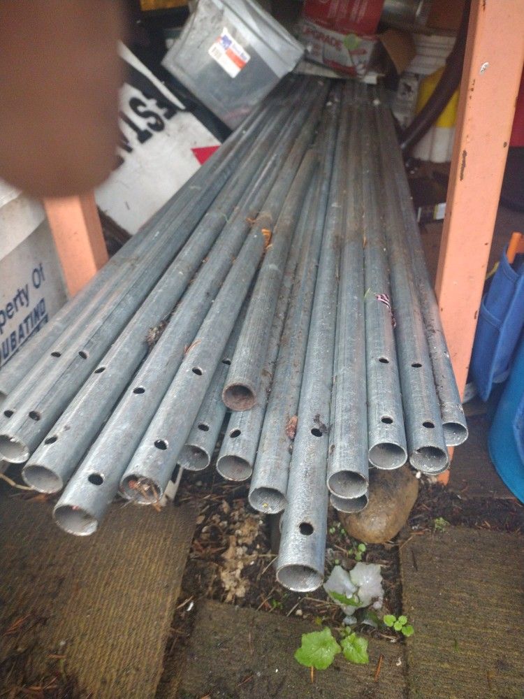 52. 3/4 10 Foot Long Metal Poles Dose Hav E To Holes At Each And And In The Middle