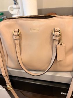 Michael Kors and Coach purses