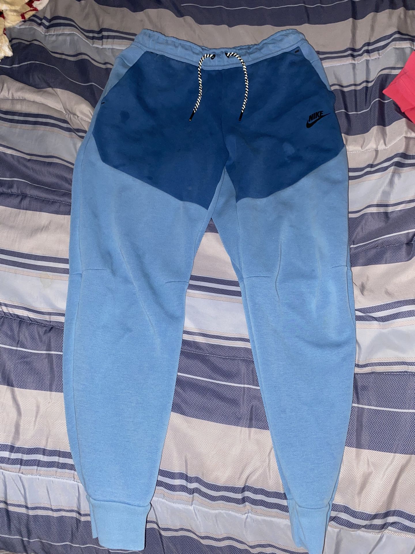 Blue nike tech pants