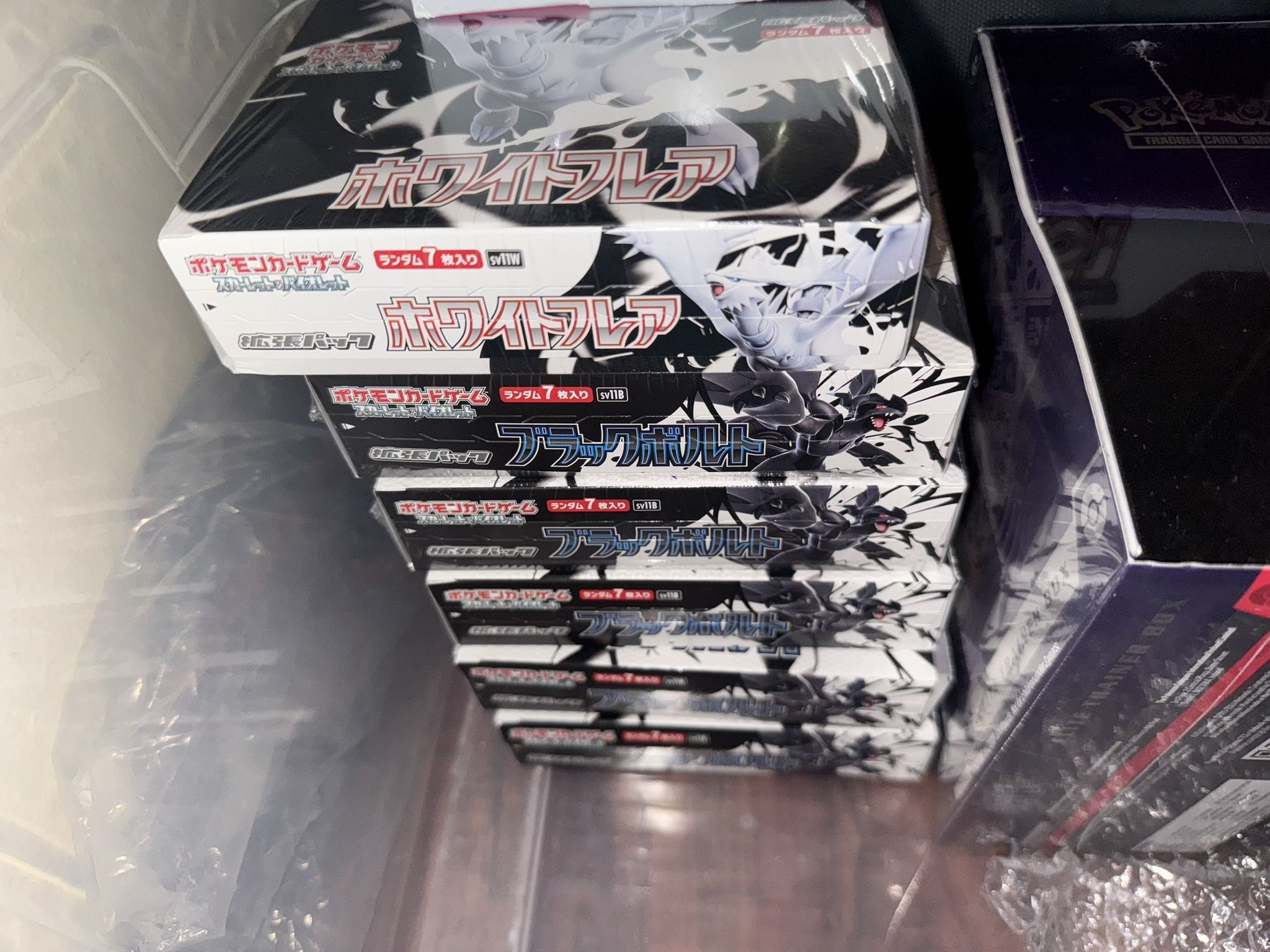 Elite Trainer Boxes Surging Sparks, Mega Evolutions, Twilight