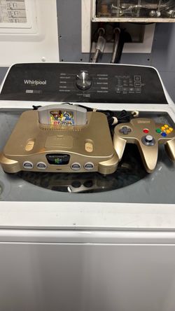 Gold Nintendo 64 Console with Controller and Game
