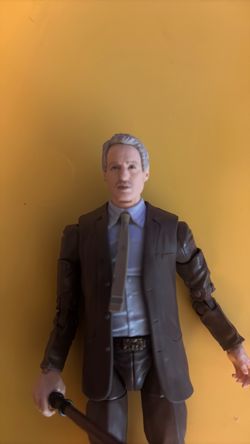 Male Action Figure in Suit with Accessory