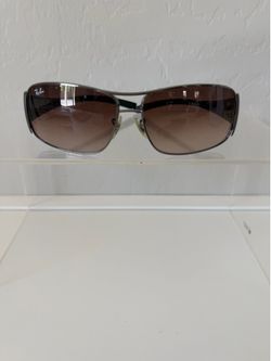 Ray-Ban sunglasses. Gunmetal frame with gradient brown lenses