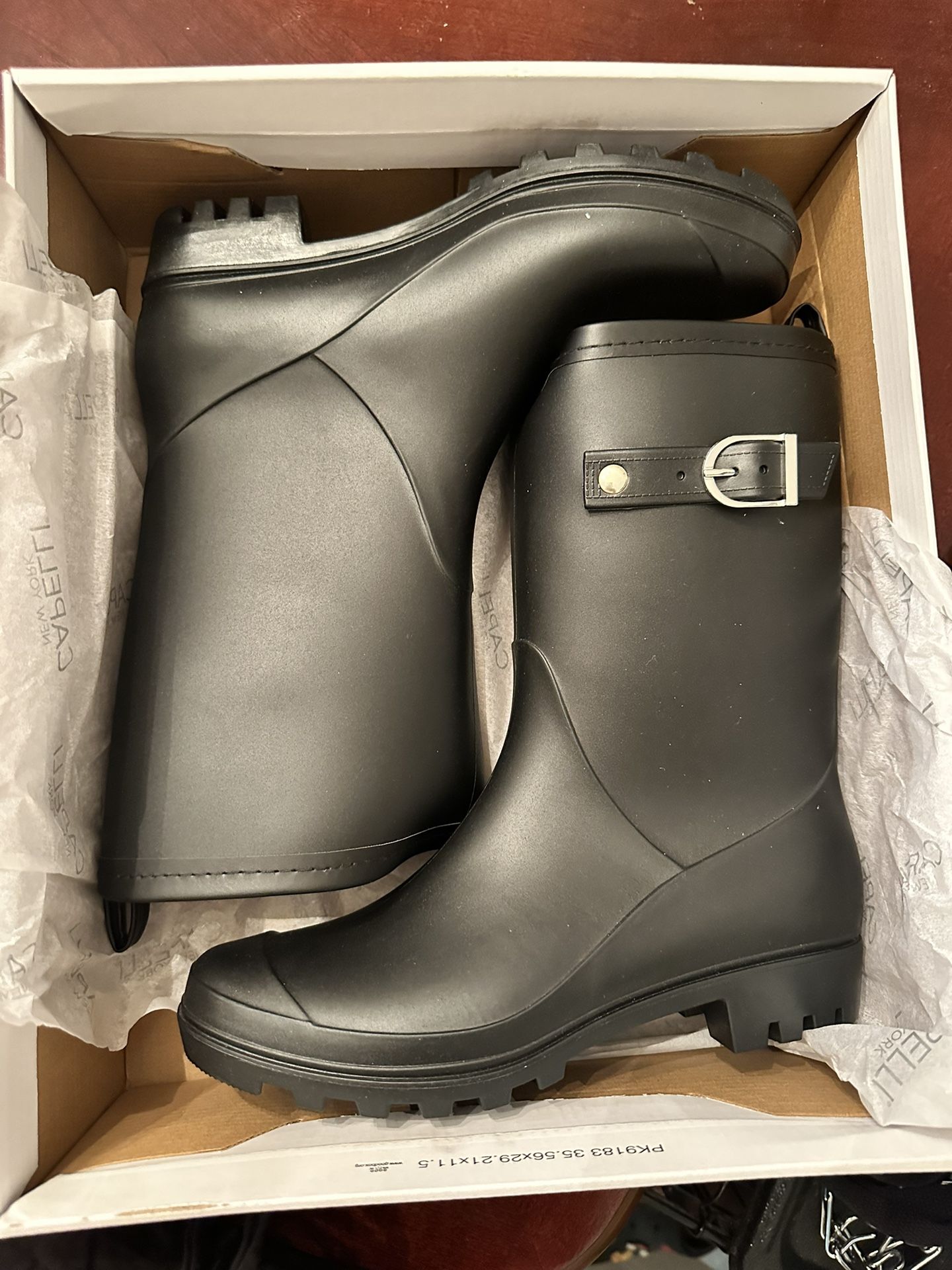 Black, mid calf rain boots 