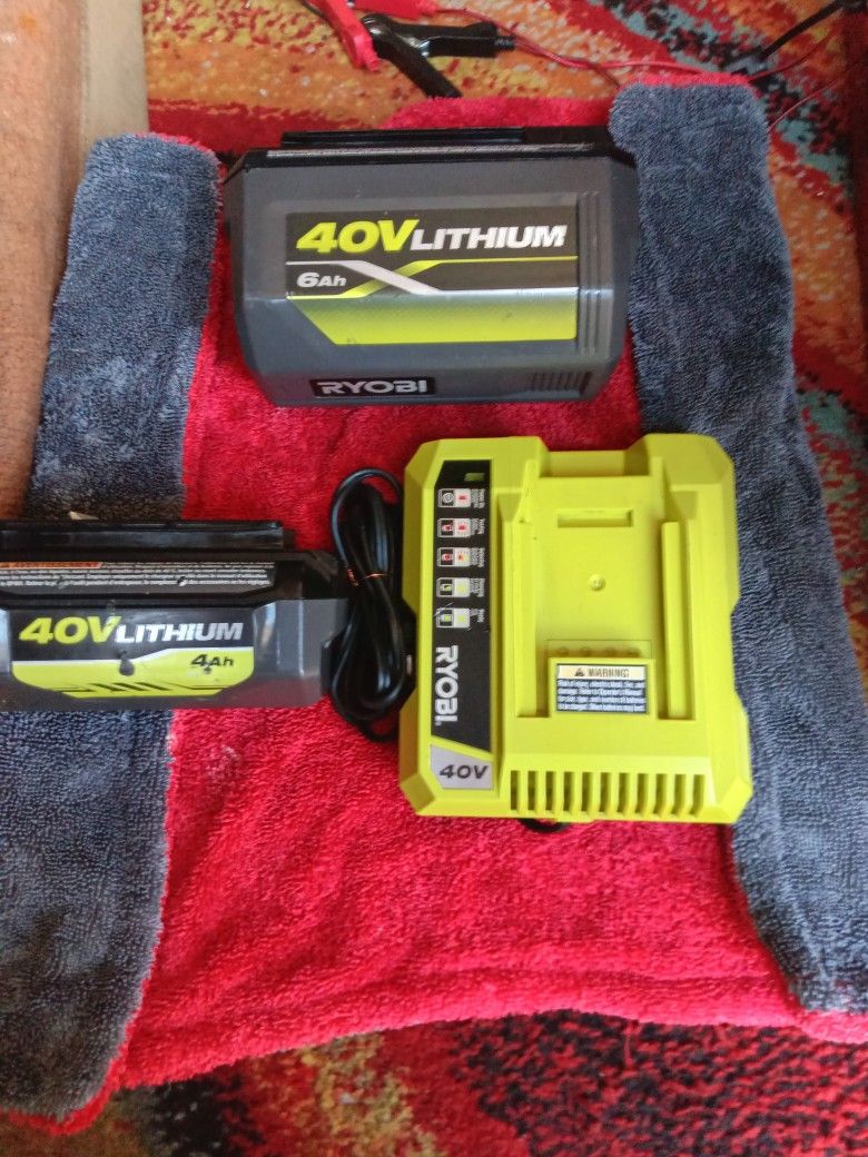 Ryobi Two 40vbatteries With Charger IncludedOne 4amps Another 6amps