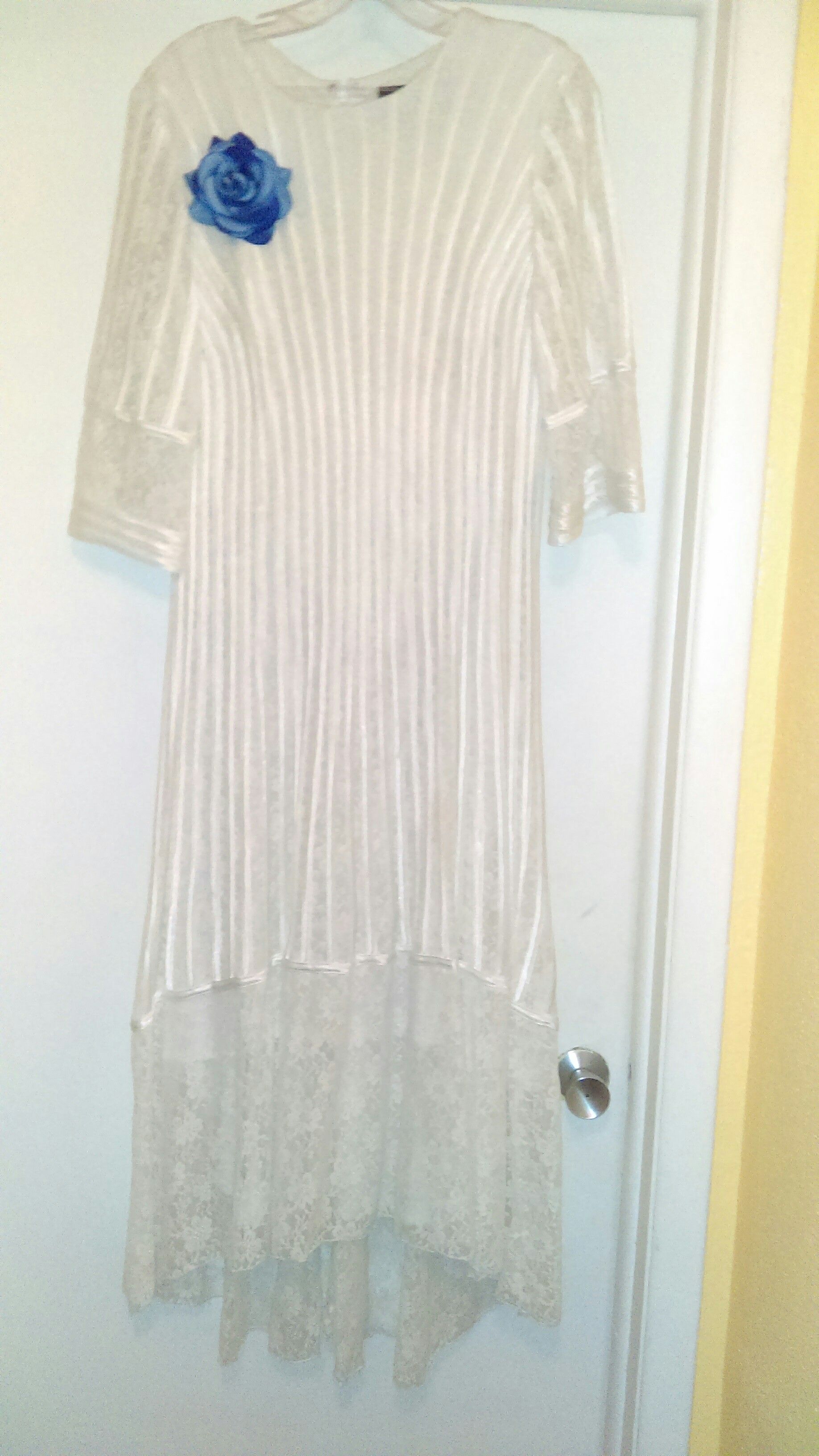 Dress by Moshita Couture.