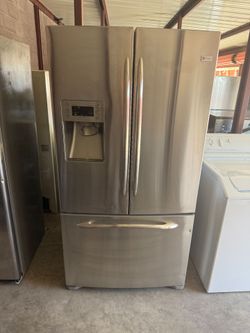 GE Stainless Steel Refrigerator And Freezer
