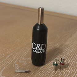 Refrigerant locking cap driver