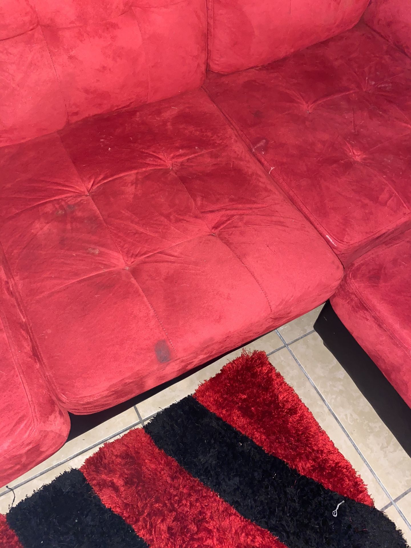 Red and black sectional couch