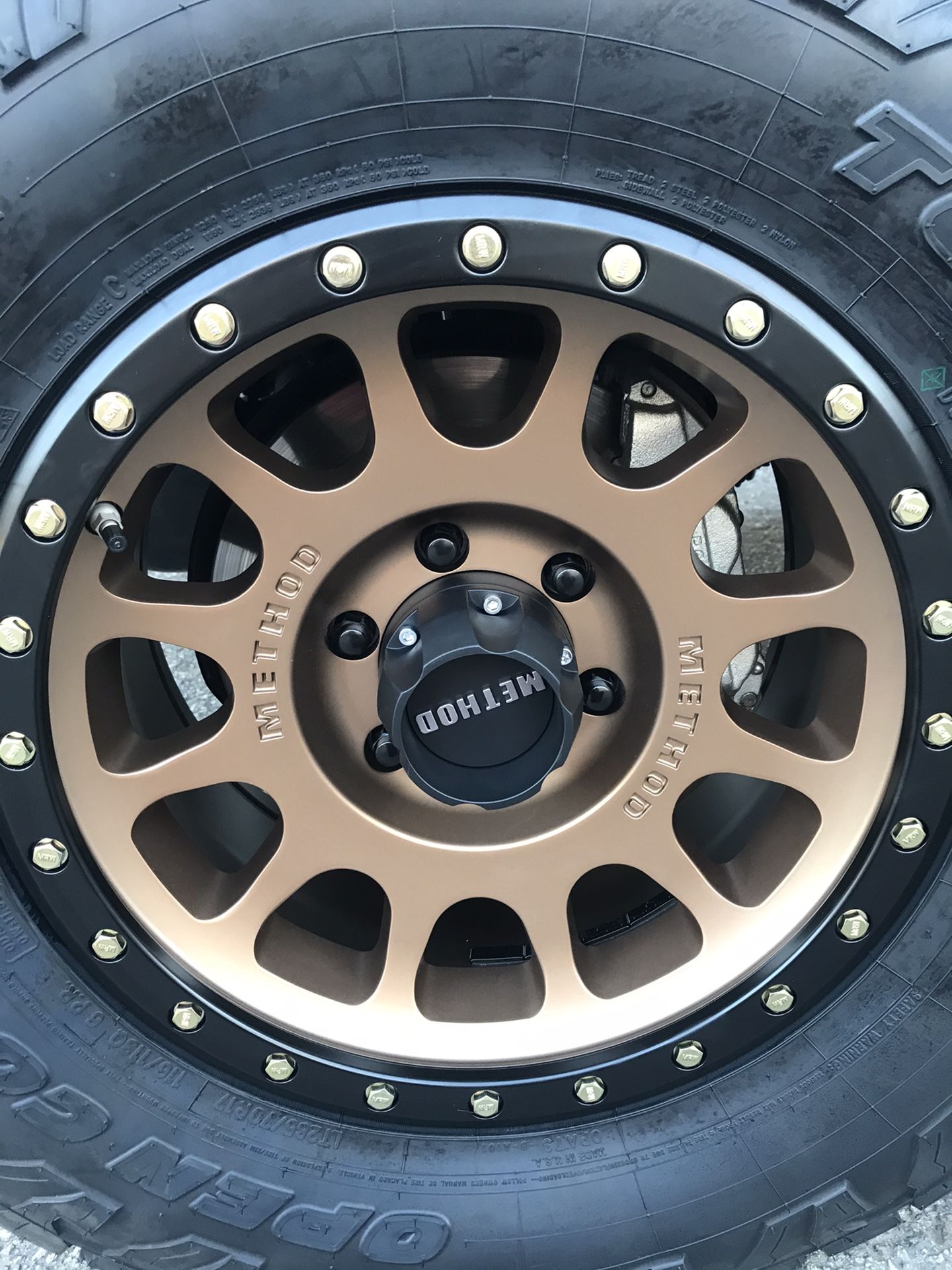 Method mr305 bronze nv wheels with TOYO open country at3 LT285/70/17 4runner Silverado