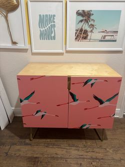 The Deny Designs Pink Flamingo Credenza