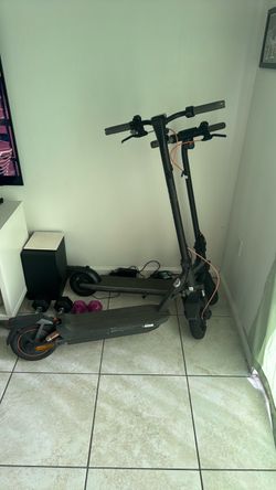 Two Black Electric Scooters