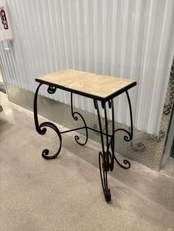 Wrought Iron  entryway table with ceramic top 24” wide , 12” depth , 29 “ high $50