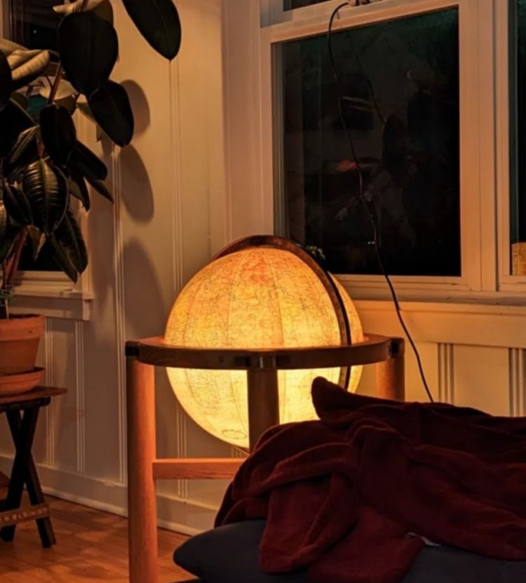 Illuminated vintage Replogle Heirloom 16" globe on an oak stand is a true gem for collectors. The multi-color world map b