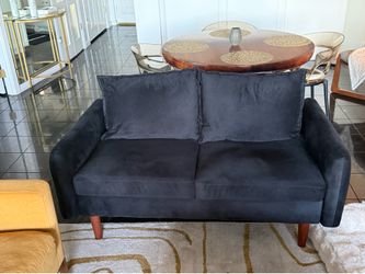 Black velveteen loveseat
