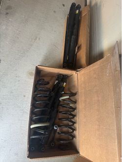 Jeep gladiator OEM front shocks and spring and rear shocks.
