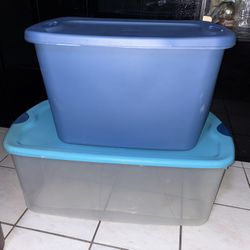 2 storage bins / totes Some marker on bottom
