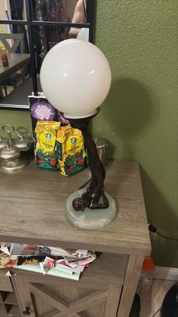 Very unique lamp I don’t know if that’s made out of Jade on the bottom base