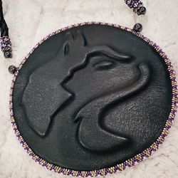 Leather and bead Washington huskies medallion